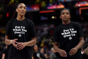WNBA Players Make A Strong Statement At All-Star Game With ‘Pay Us What You Owe Us’ Shirts