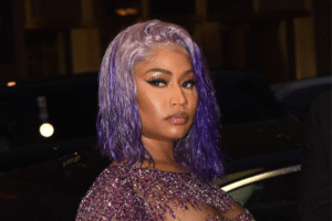 Nicki Minaj Clashes With SZA Over TDE Exec Punch In Heated Social Media Blowup