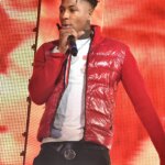 NBA YoungBoy Tosses Cash Into Horde Of Fans Ahead Of Tour