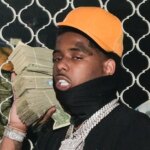 Pooh Shiesty Flexes Huge Stacks Of Cash After Prison Release