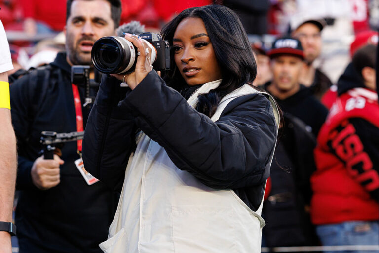 Simone Biles Served As An Official NFL Photographer During Bears-49ers Game