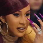 Cardi B Gives Men A Hilarious Tutorial On How To Eat A Banana