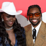 Hi Haters: Junelle Lyles Defends Husband Noah Lyles’ Understated Reaction To Her Wedding Dress, Insists It Was ‘Exactly What She Needed’