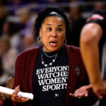 Geno Auriemma Apologizes For Running Up On Coach Dawn Staley—But Not Directly