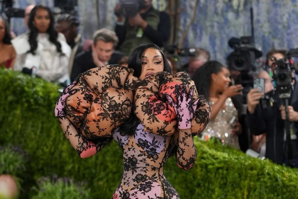 Cardi B Slays Met Gala In Skin Tight Sheer Black Lace & Teal Mermaid Gown