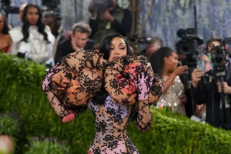 Cardi B Slays Met Gala In Skin Tight Sheer Black Lace & Teal Mermaid Gown