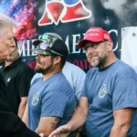 ‘Wow’: Trump’s Photo Op with Blue-Collar Workers Backfires When Fans Zoom In on What They Got for Showing Up Like Extras on Set