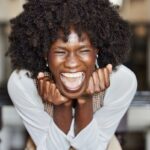 The Relaxer Grow-Out Struggle Is Real — 4 Expert Tips To Survive The Awkward Phase Without Losing Your Hair